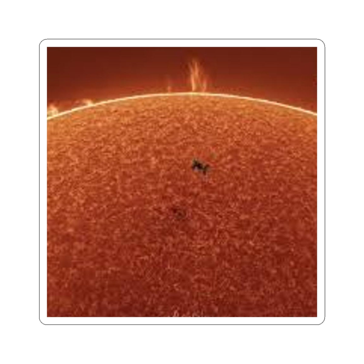 Autocollant découpé en forme de silhouette de navette spatiale devant le soleil