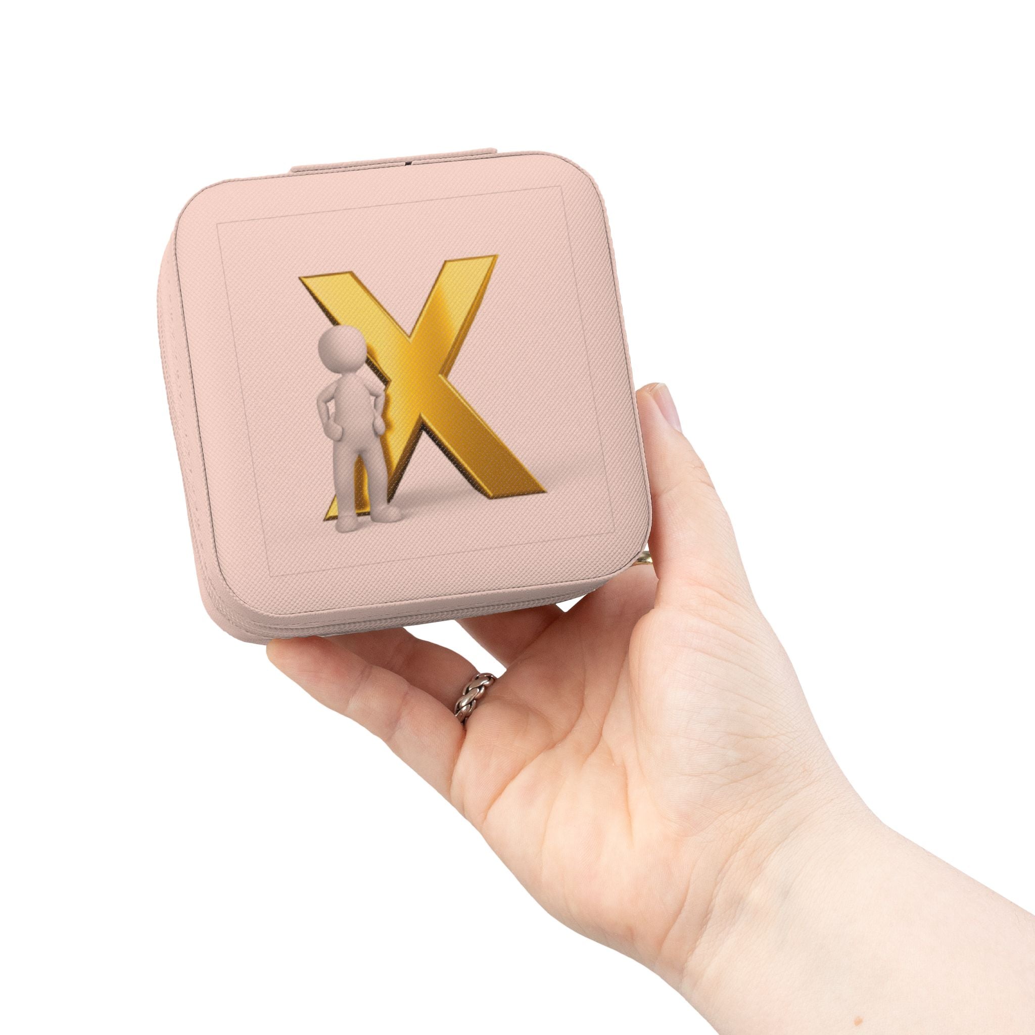 Étui de voyage compact rose pour bijoux avec monogramme X doré
