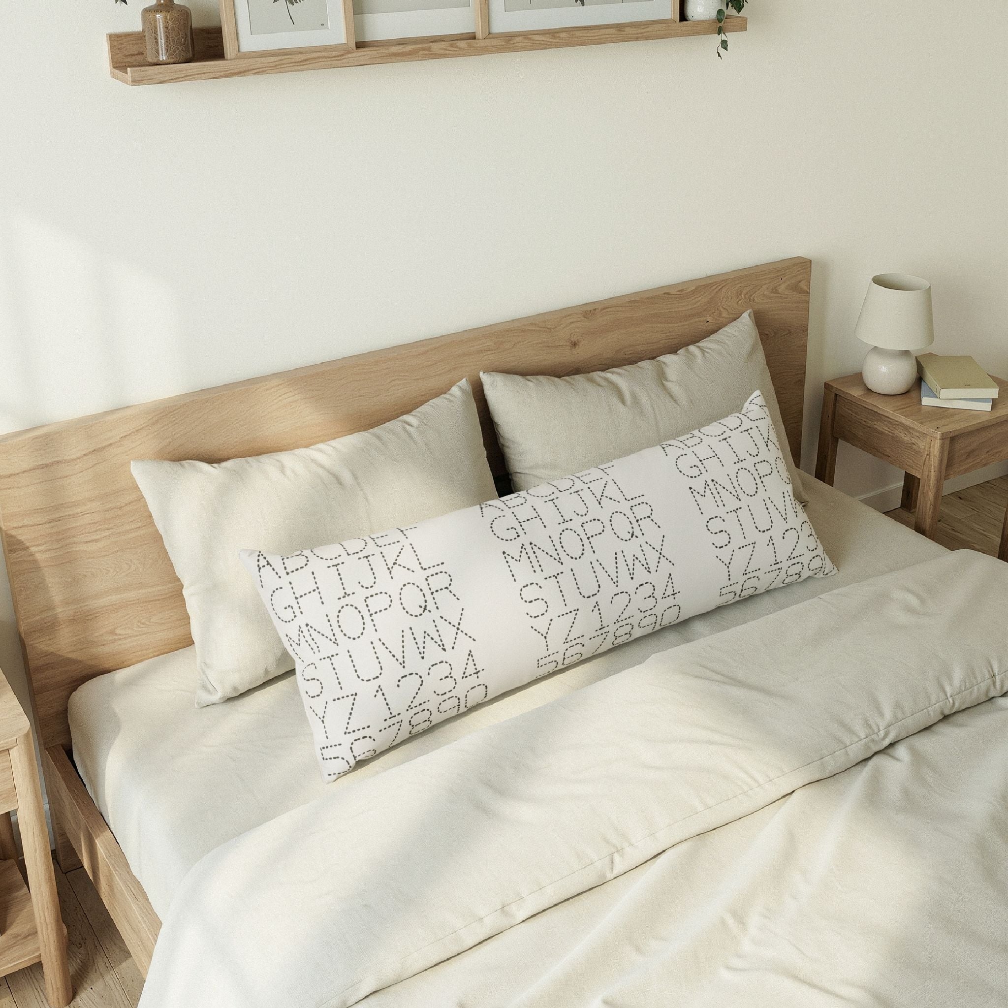 Alphabet Stitch Pattern Body Pillow | Typographic Nursery Decor