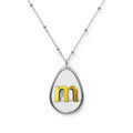 Personalized Oval Initial Necklace — Gold Letter M.